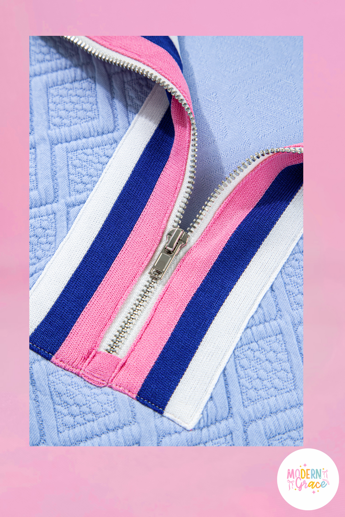 Blue striped T-shirt dress with puff sleeves, textured fabric, stand collar, and zip closure by Modern Grace.