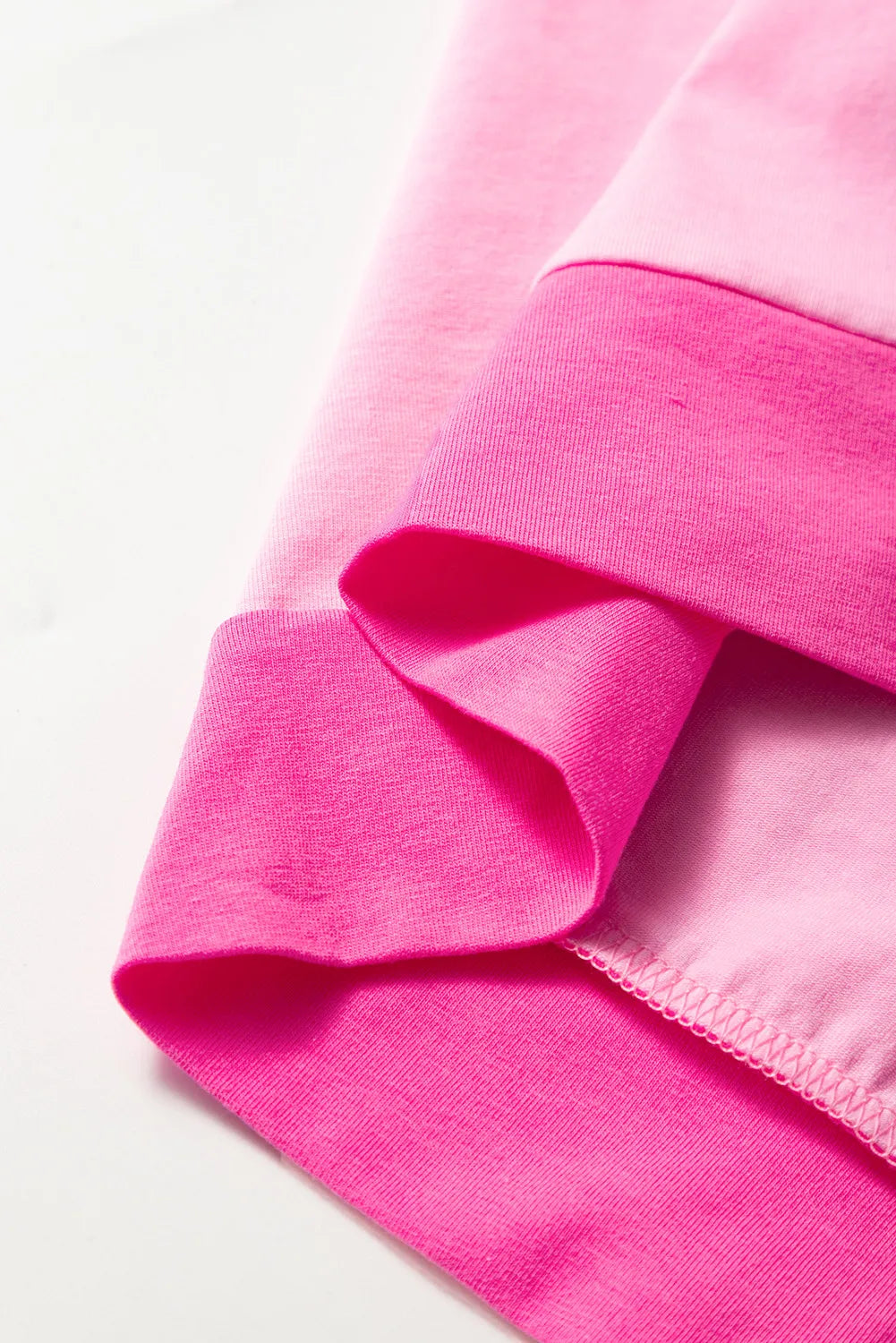 Plus size Bright Pink Colorblock Patchwork Henley top by Modern Grace, featuring short sleeves and button details.