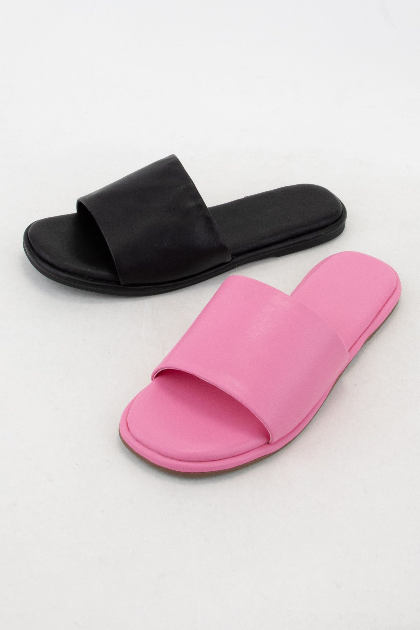 Pink padded sole slides by Modern Grace with cushioned footbed and open-toe design for comfortable casual wear.