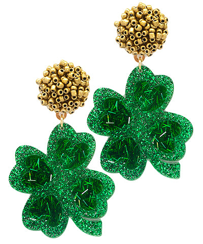 Shimmering glitter clover earrings by Modern Grace featuring sparkling green gemstone accents and silver-tone hooks.
