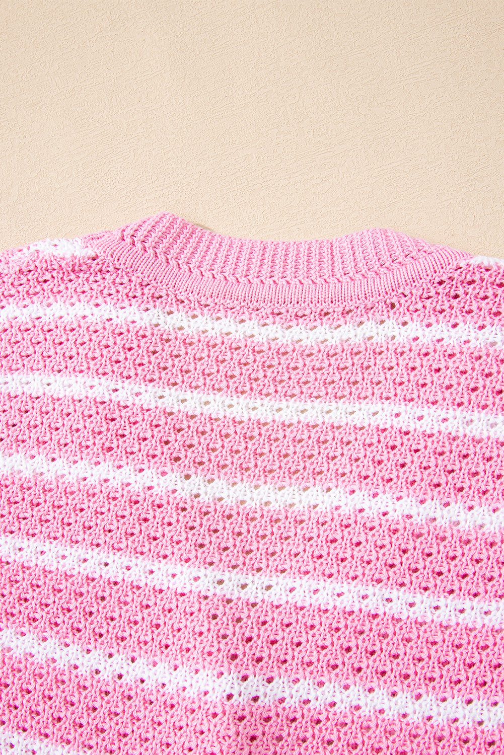 Pink stripe V-neck sweater vest by Modern Grace with gold buttons, featuring an elegant design and soft, lightweight knit fabric.