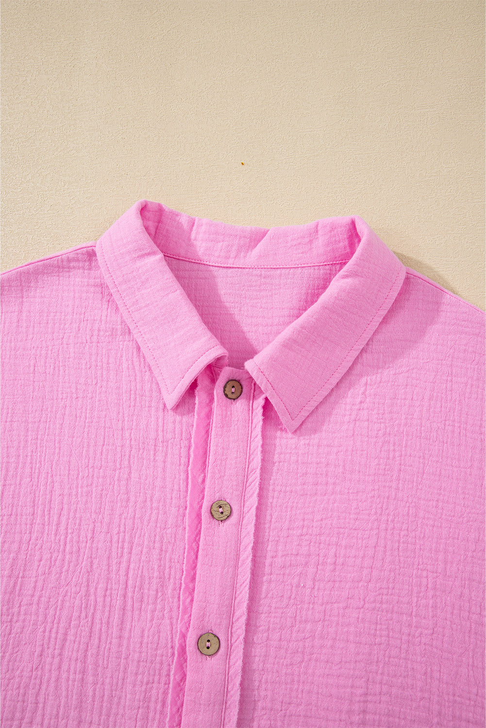 Modern Grace Bonbon Mineral Wash Textured Ruffle Trim Short Sleeve Shirt, 100% cotton, casual blouse with ruffle details.