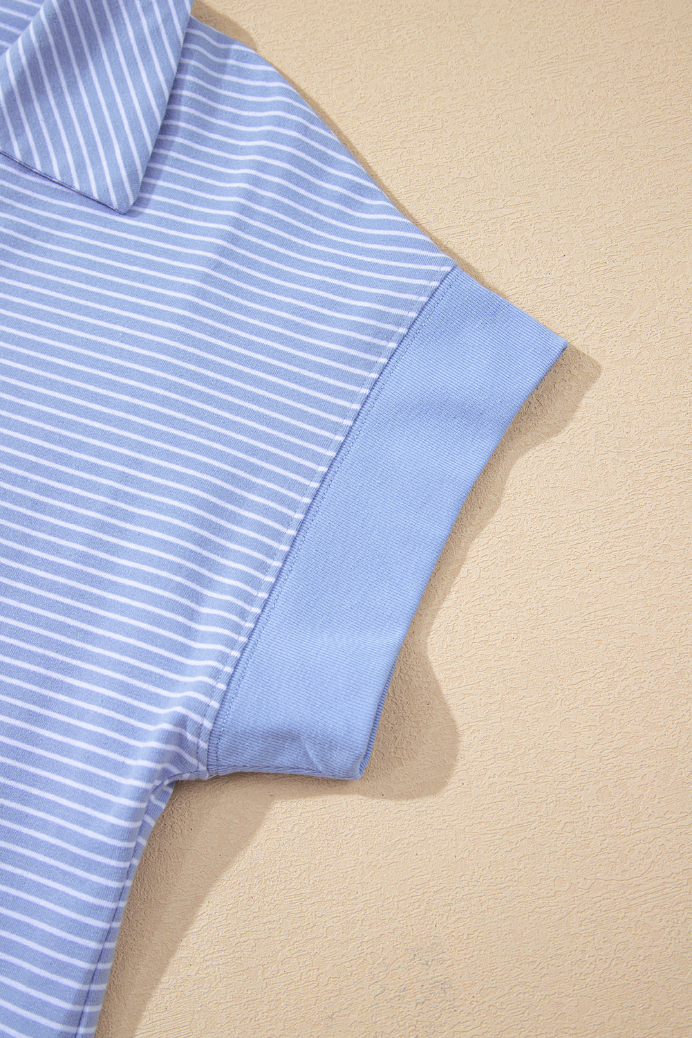 Sky blue stripe dolman sleeve polo shirt and drawstring shorts set by Modern Grace, casual two-piece cotton and elastane outfit.
