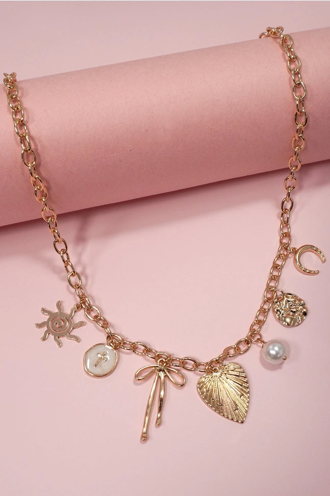 Sun Bow Pearl Cross Disc U Charm Necklace