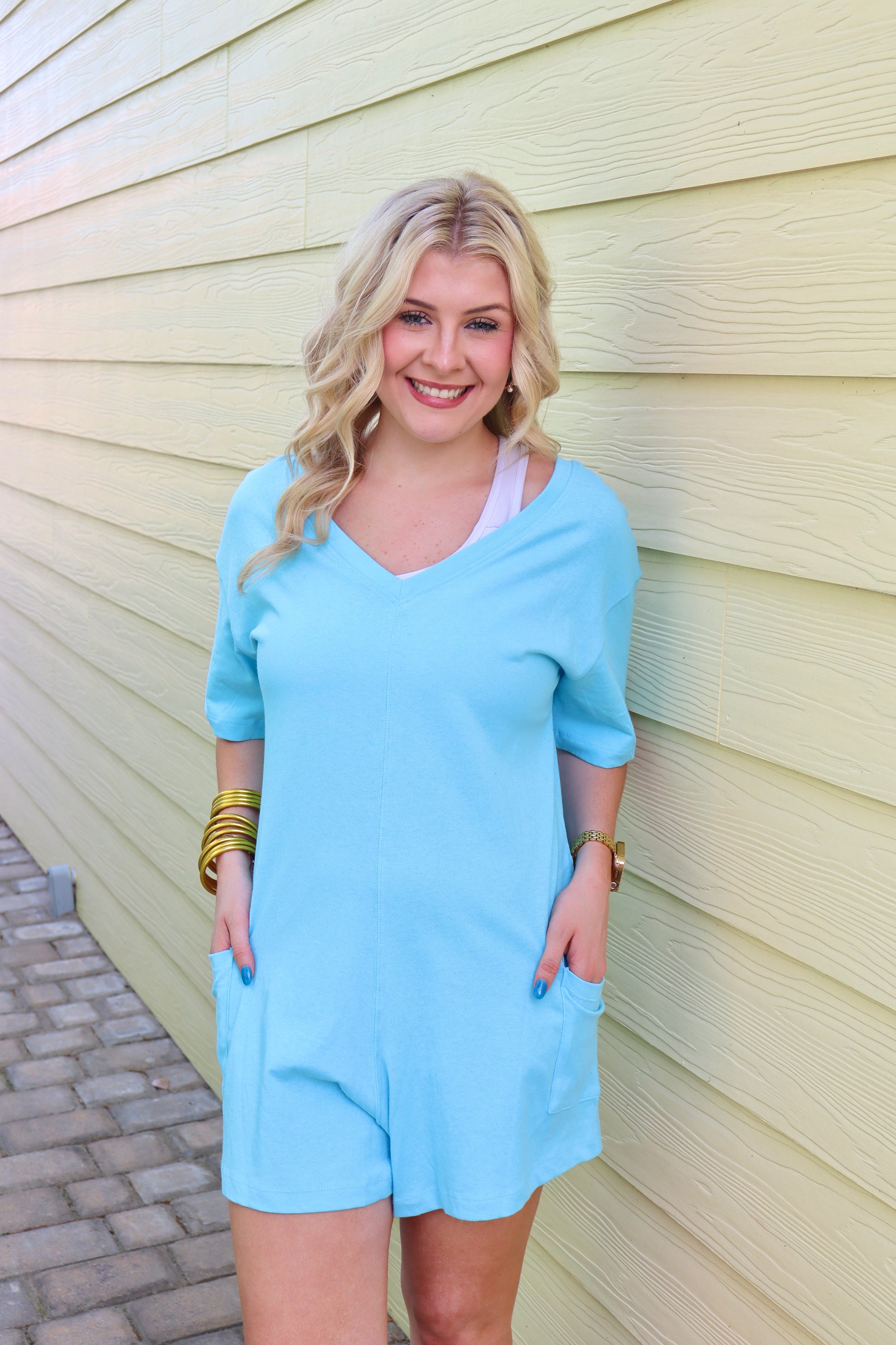 Reversible Zenana deep sky V or scoop neck romper with pockets, showcasing its versatile two-way design and comfortable fit.