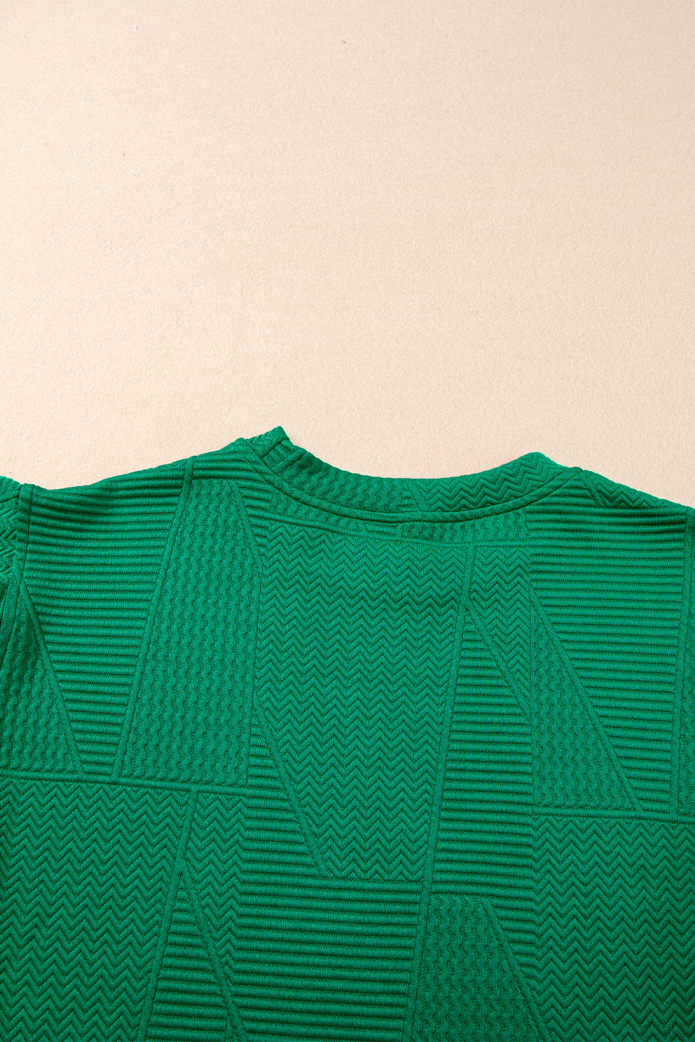 Modern Grace dark green textured ruffle split top and drawstring shorts two-piece set, stylish summer outfit for women.