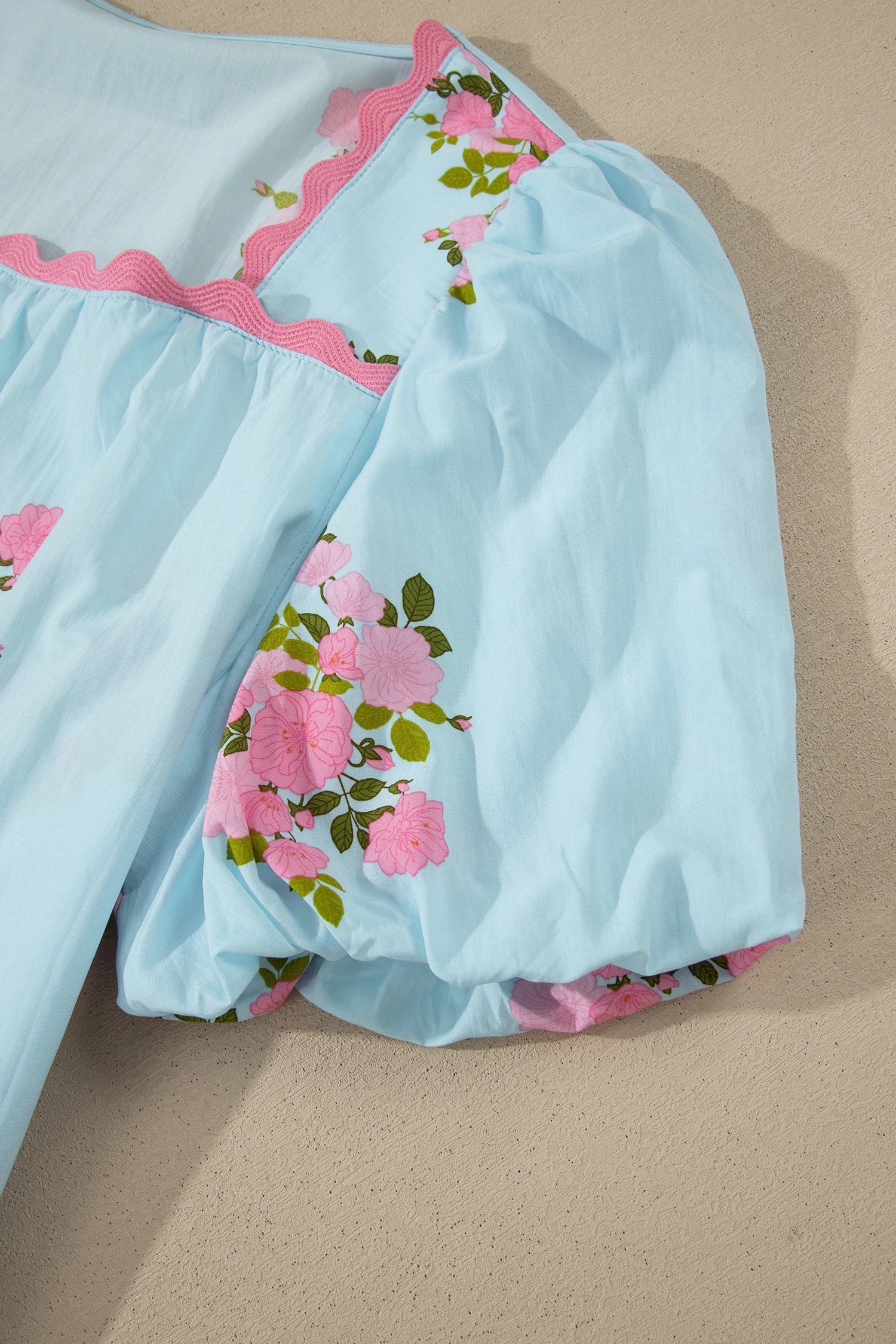 Sky blue floral ricrac trim square neck blouse with bubble sleeves by Modern Grace, featuring a stylish and feminine design.