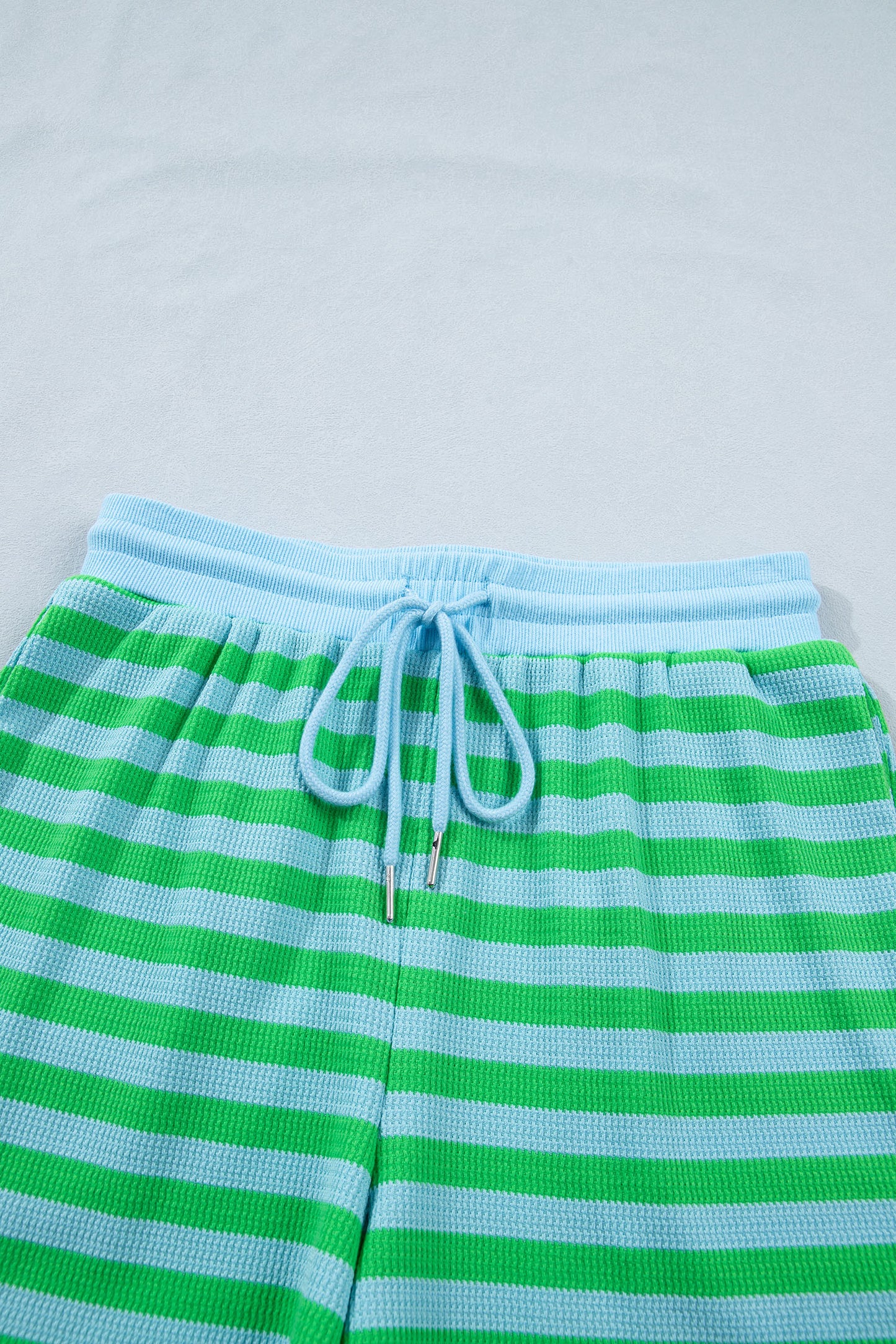 Modern Grace green stripe puff short sleeve T-shirt and matching shorts set for women, casual summer two-piece outfit.