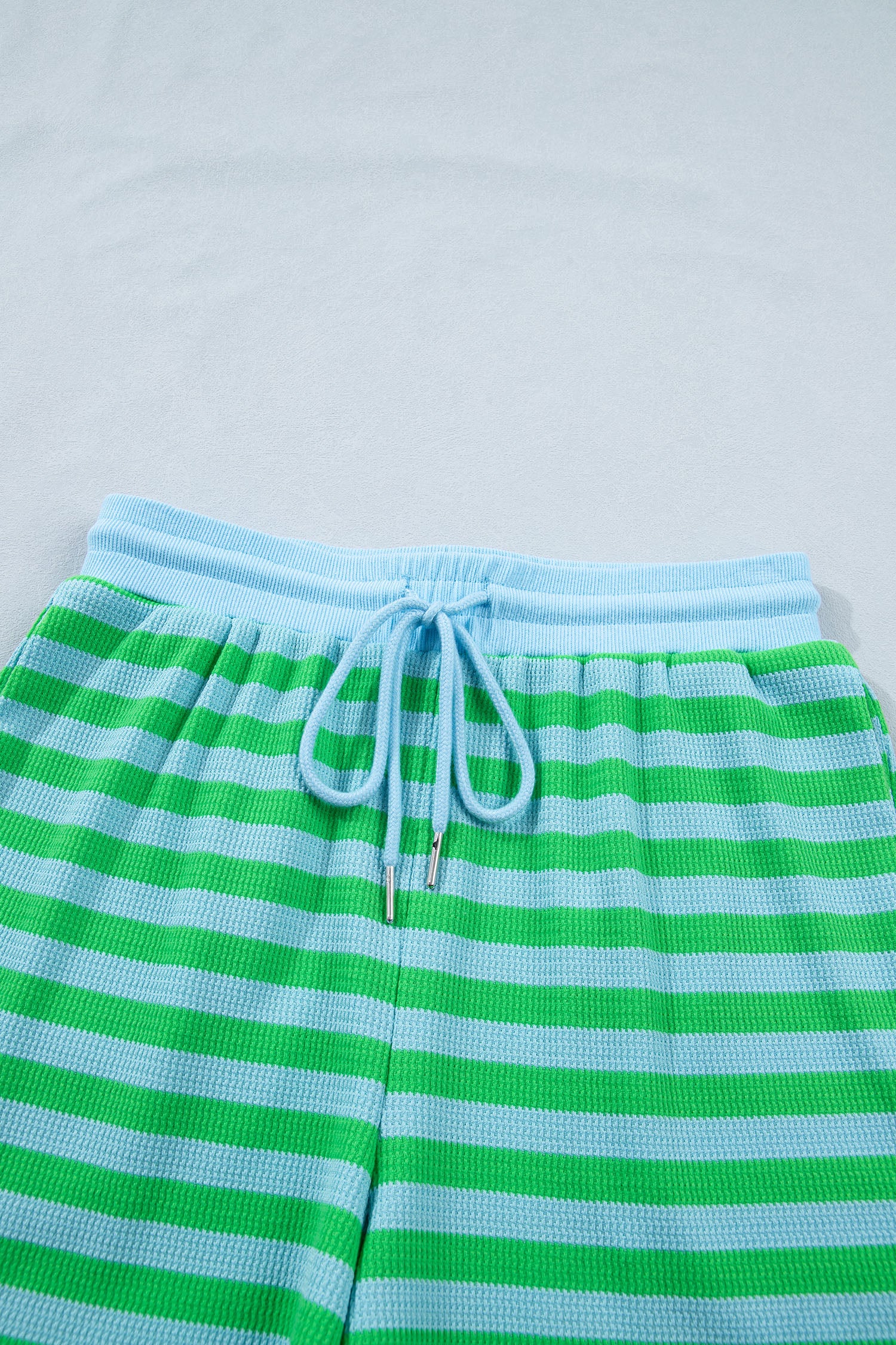Modern Grace green stripe puff short sleeve T-shirt and matching shorts set for women, casual summer two-piece outfit.
