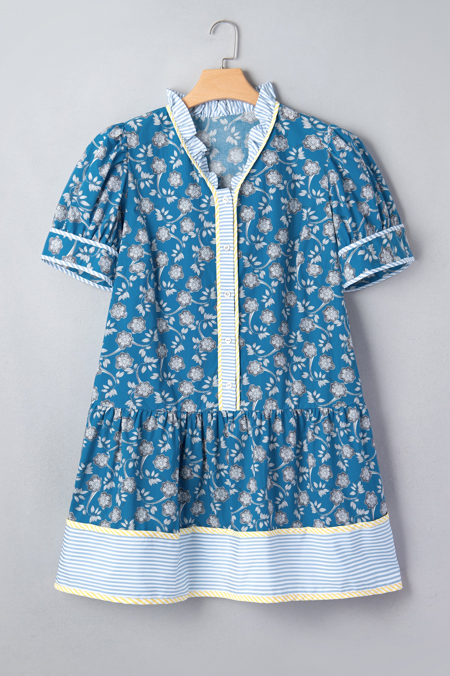 Plus size floral print striped patchwork mini dress by Modern Grace with button front and ruffle hem, blue color.