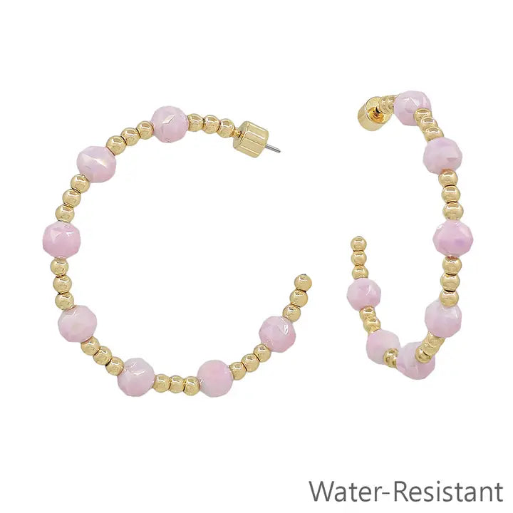Water-resistant gold beaded hoop earring with pink crystals, 2-inch size, stylish jewelry piece from What's Hot