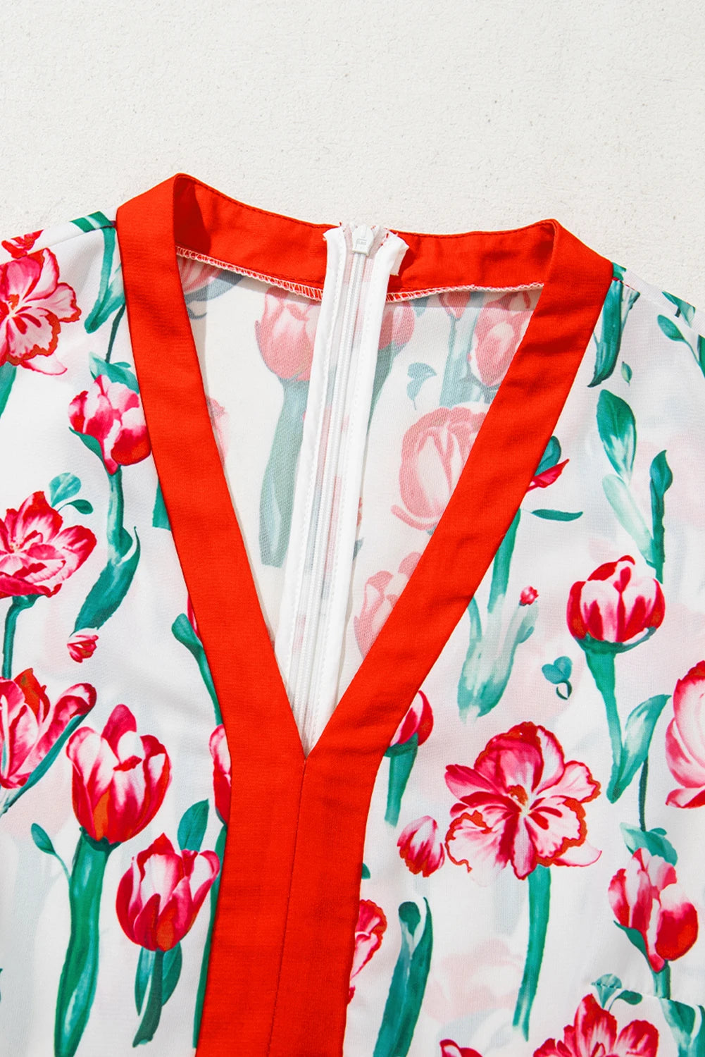Pink floral print V-neck bubble short sleeve babydoll dress by Modern Grace, featuring a flowy silhouette and feminine design.