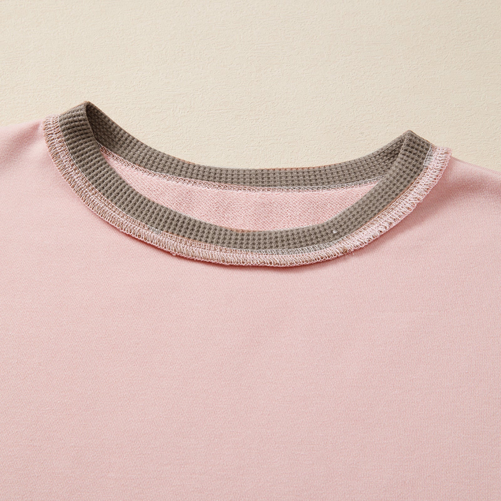 Light pink Modern Grace oversized sweatshirt with color block and waffle patchwork texture, casual and cozy for everyday wear.