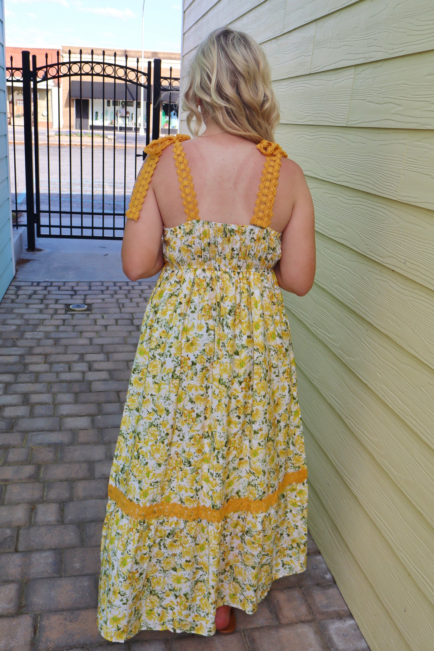 Modern Grace banana cream floral lace empire waist maxi dress with tied straps and elegant design, perfect for summer or special occasions.