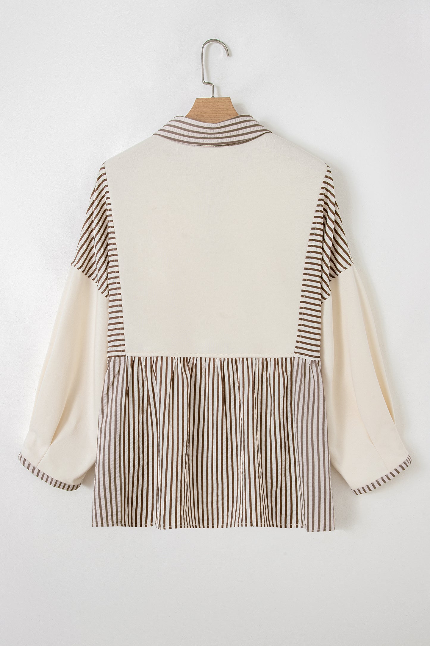 Plus size khaki stripe patchwork blouse by Modern Grace featuring half buttons, long sleeves, and peplum style.