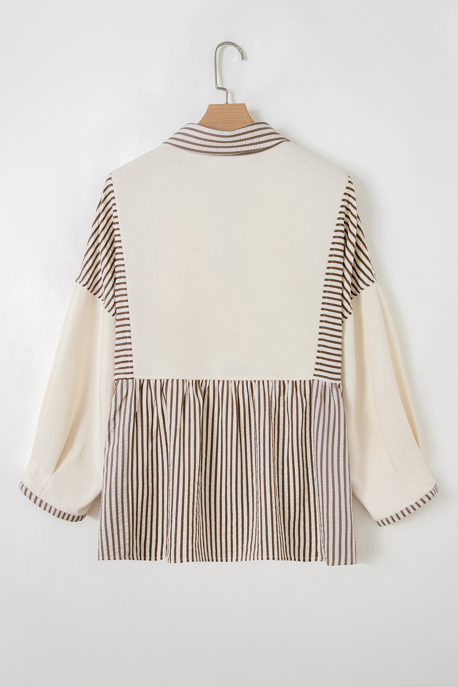 Plus size khaki stripe patchwork blouse by Modern Grace featuring half buttons, long sleeves, and peplum style.