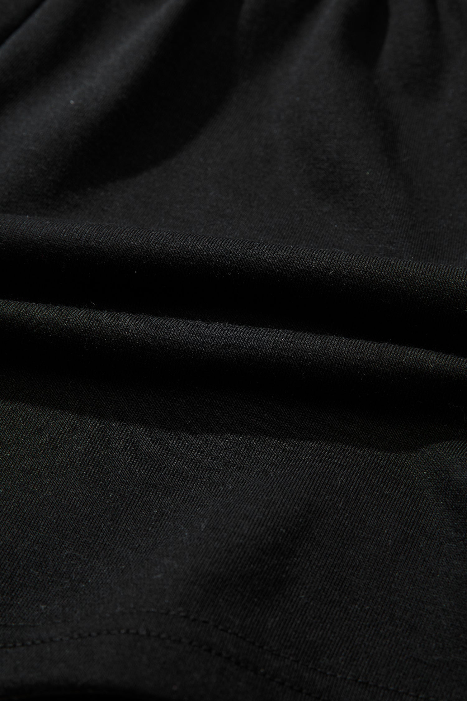 Black leopard print V-neck loose tee and drawstring shorts set by Modern Grace, two-piece casual loungewear.