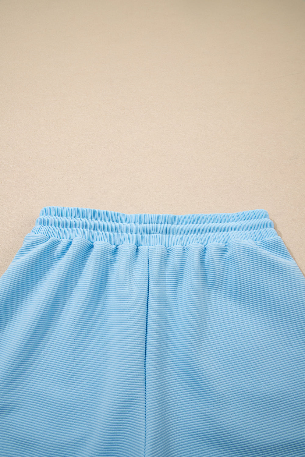 Modern Grace Beau Blue striped short set with flutter sleeves and zippered collar, two-piece summer outfit.