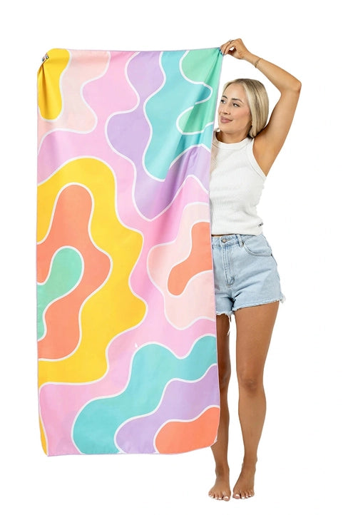 Modern Grace Groovy Flower reversible microfiber beach towel with vibrant floral pattern, perfect for beach accessories.