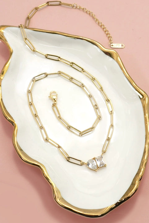 Gold 18K stainless steel rhinestone necklace with tarnish-free finish from JOSSLYN by Wall to Wall, featuring sparkling rhinestones.
