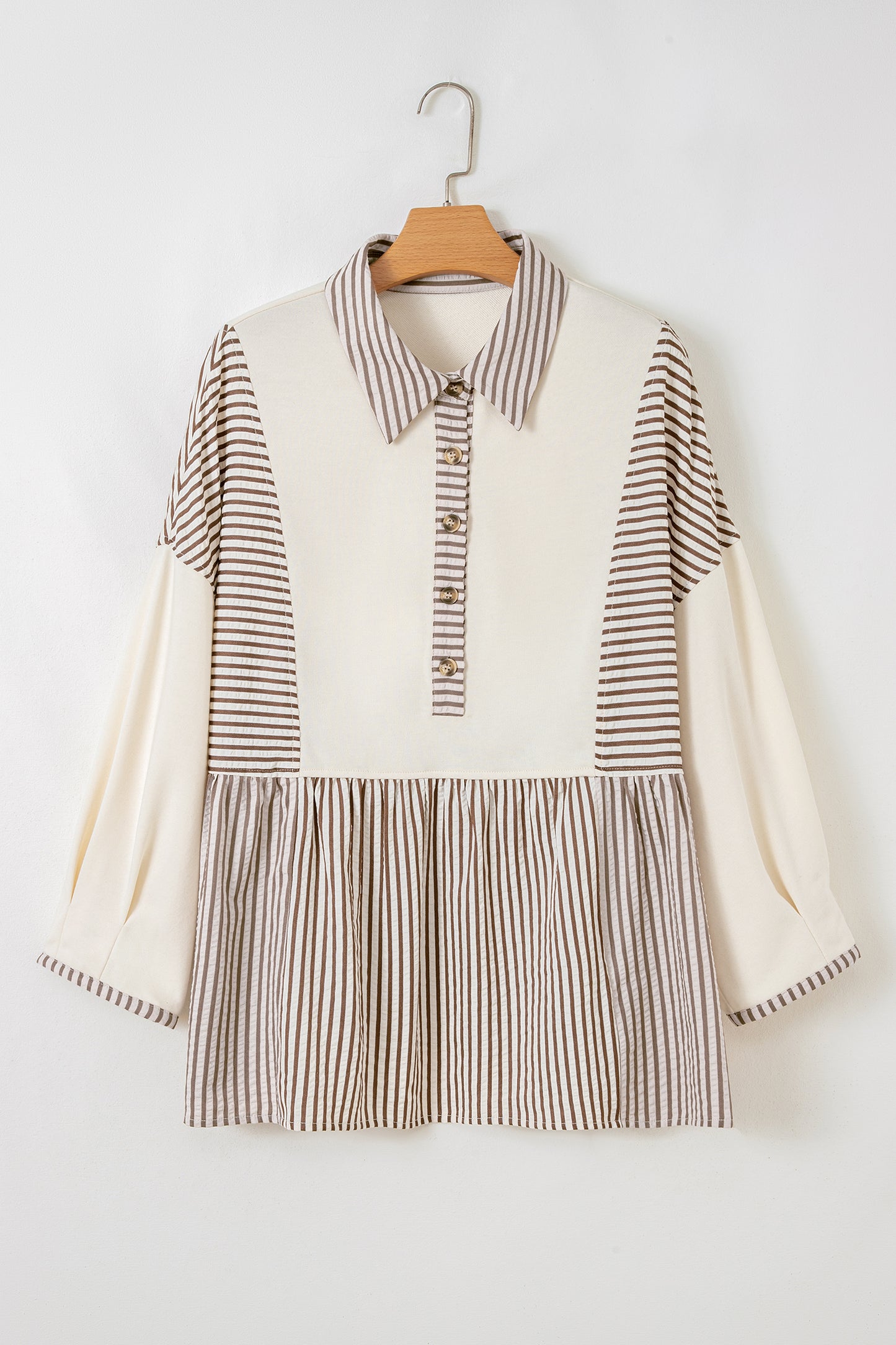 Plus size khaki stripe patchwork peplum blouse by Modern Grace featuring long sleeves and half button front.