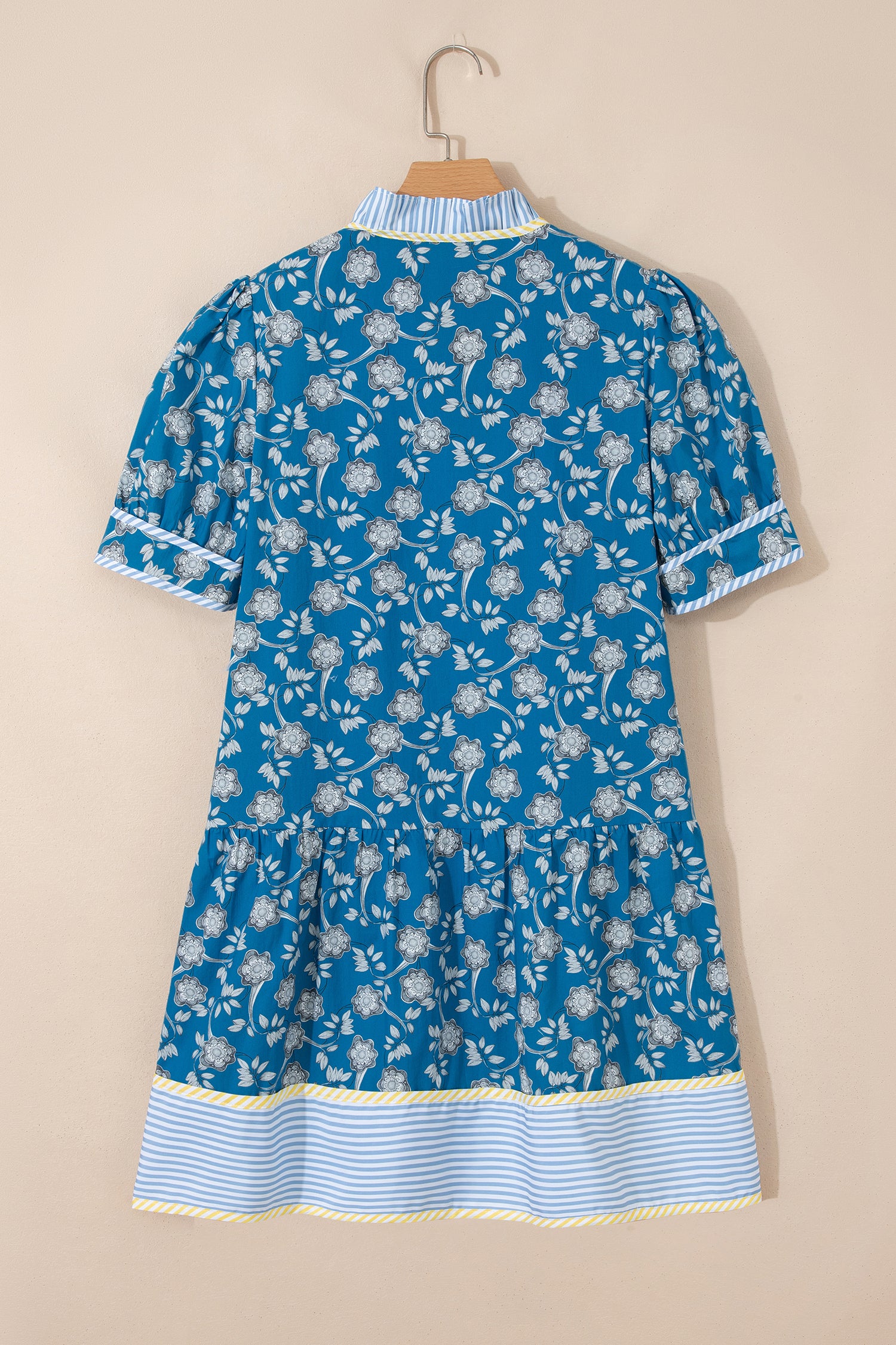 Blue striped floral dress by Modern Grace with half buttons, short sleeves, and trim details, perfect for casual or summer wear.