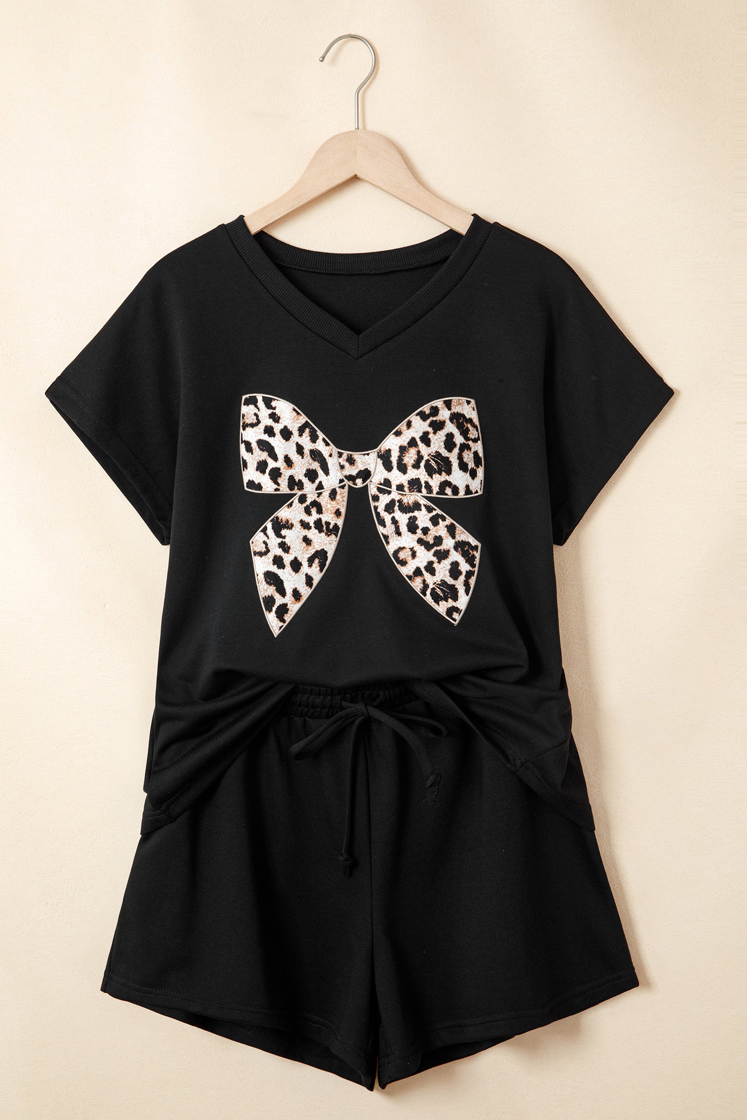 Black leopard bow V-neck loose tee and drawstring shorts set by Modern Grace, stylish two-piece casual outfit.