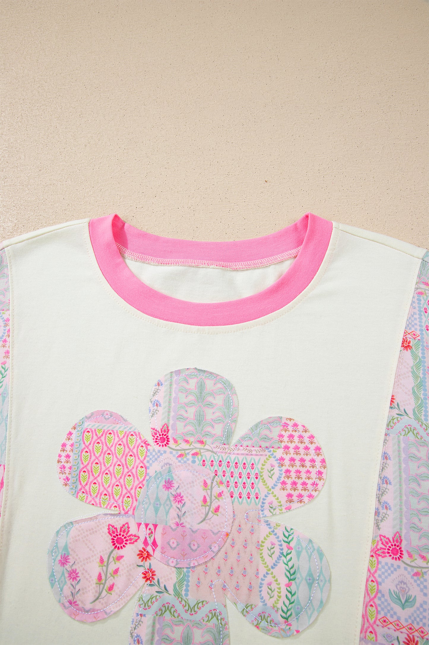 Beige color block floral patchwork relaxed top by Modern Grace featuring large flower accents, casual style, and comfortable fit.