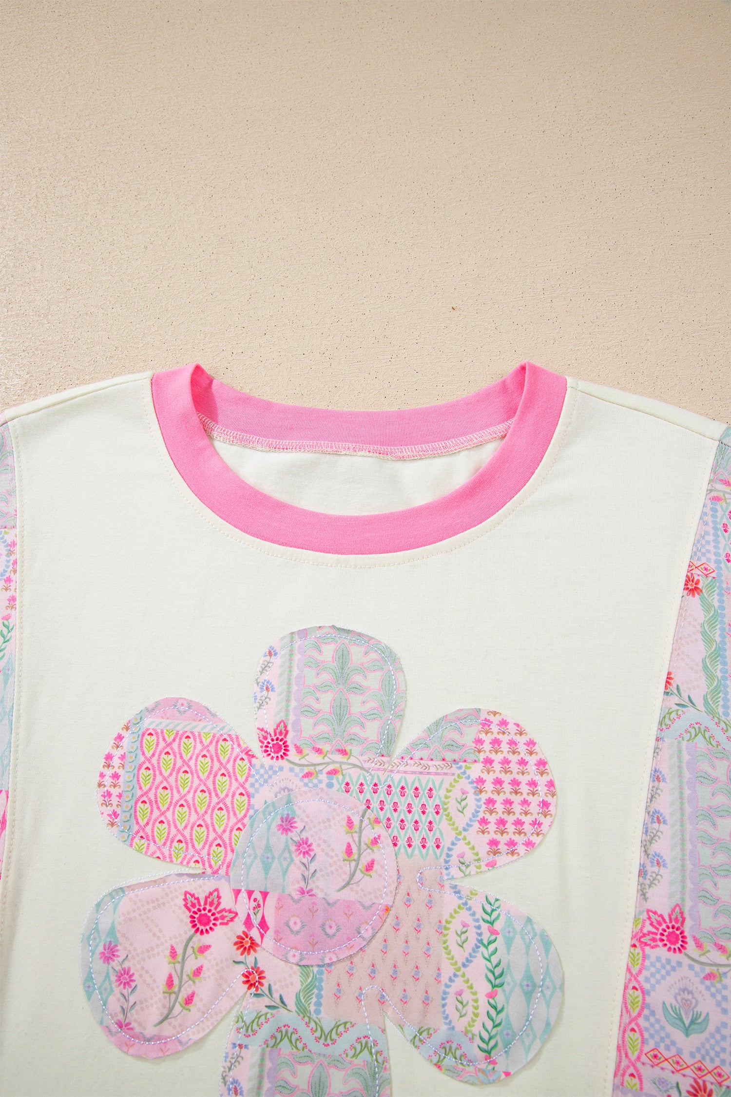 Beige color block floral patchwork relaxed top by Modern Grace featuring large flower accents, casual style, and comfortable fit.