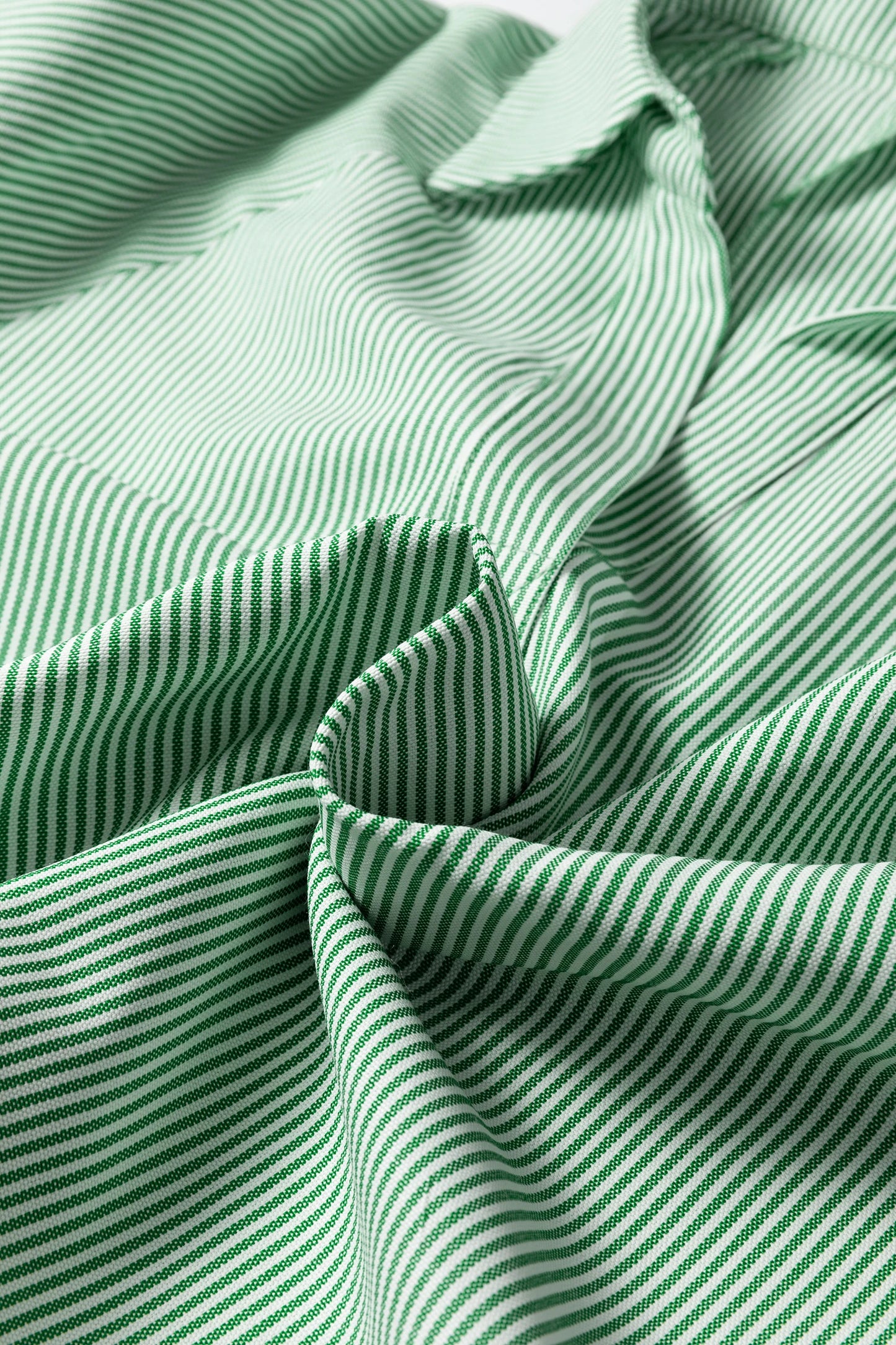 Green striped print blouse by Modern Grace featuring a split neck, collar, and half sleeves.