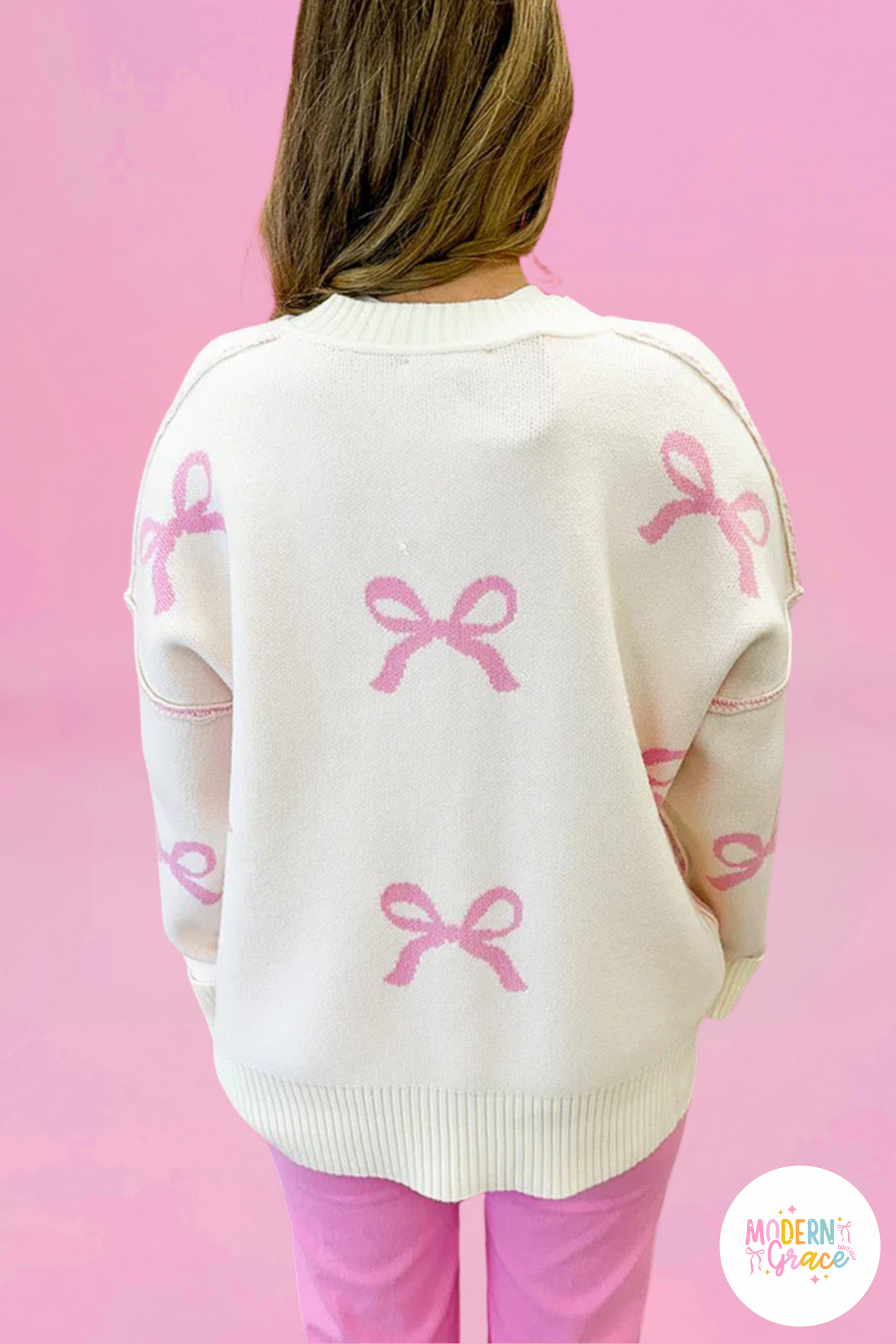 Pink Bow Print Ribbed Trim Exposed Seam Drop Shoulder Loose Sweater (Warehouse Exclusives - Online only)