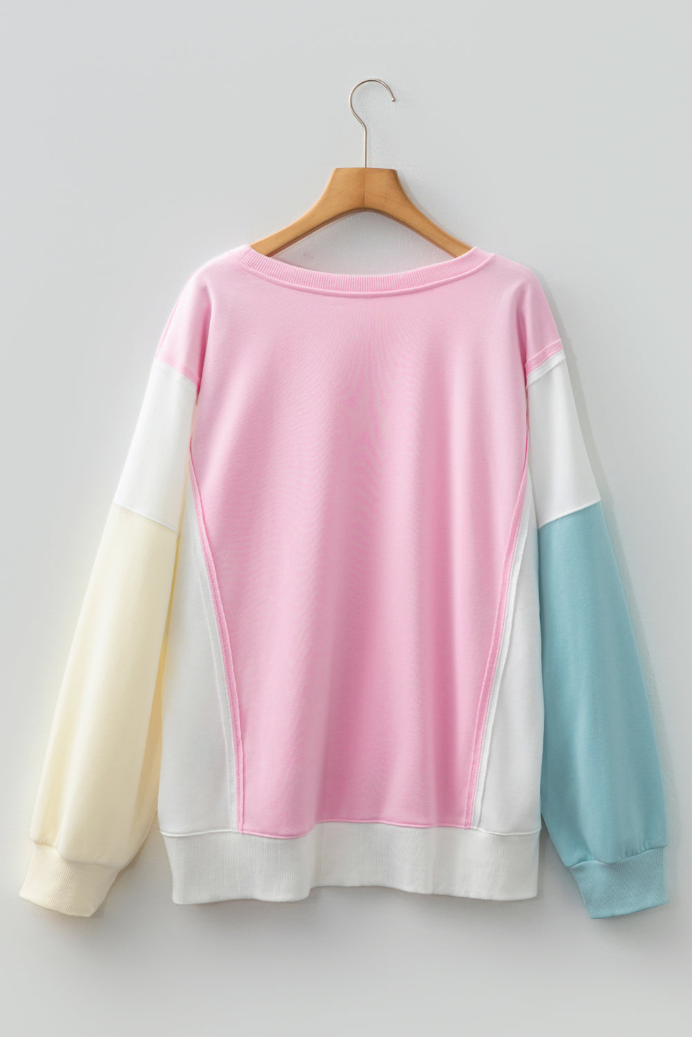 Plus size Modern Grace pink colorblock patchwork sweatshirt with a cozy fit, featuring bold design and casual style.