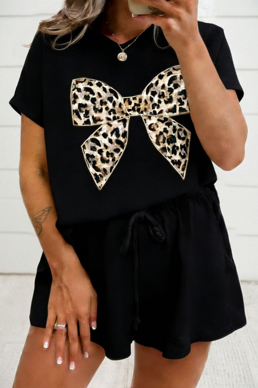 Modern Grace black leopard bow V-neck loose tee and drawstring shorts set, two-piece casual outfit for women.