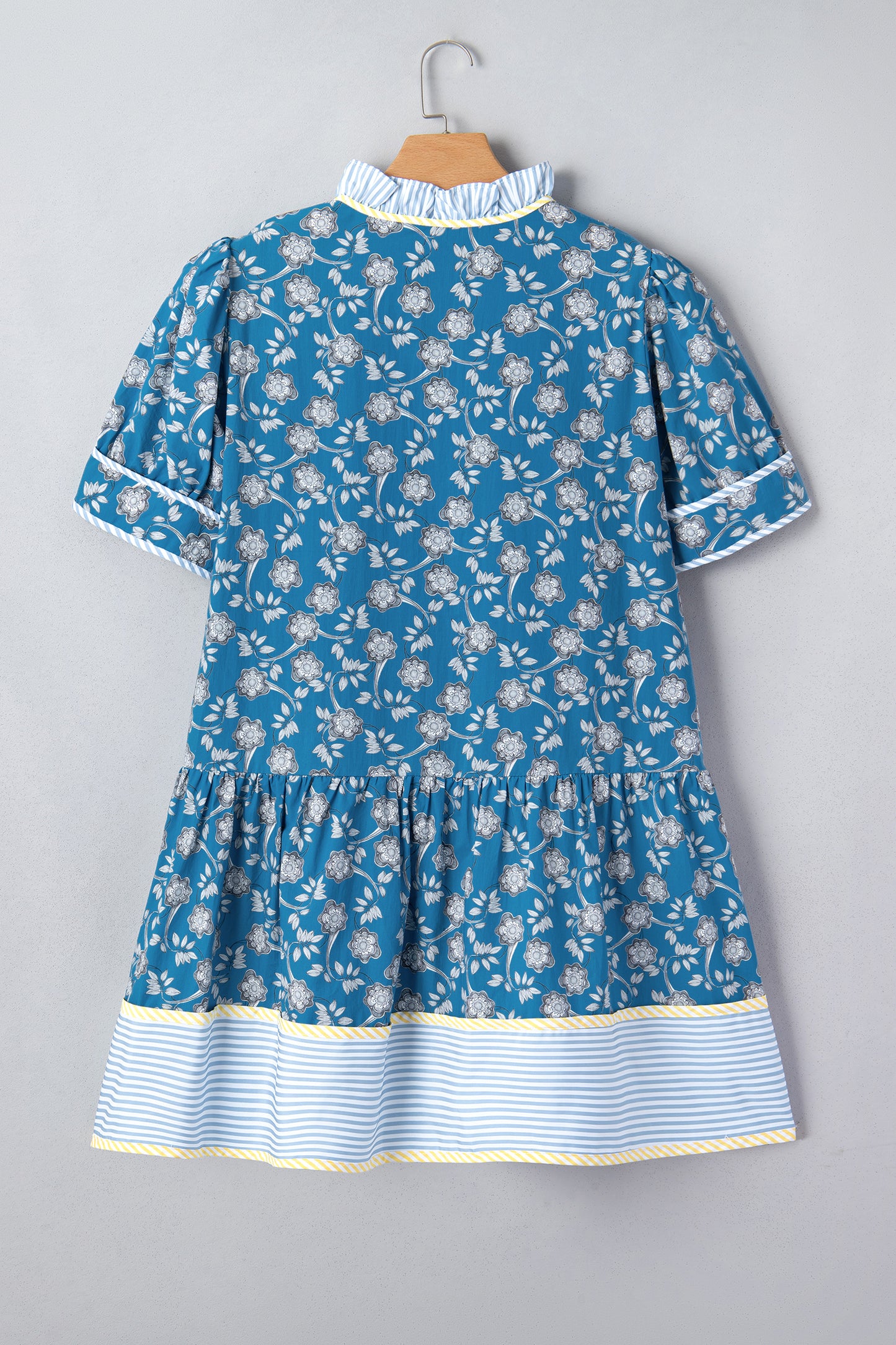 Blue plus size floral print striped patchwork mini dress by Modern Grace, featuring button front and ruffle hem detail.