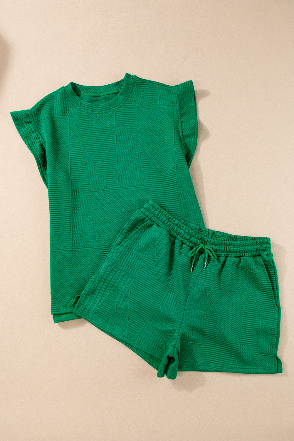 Dark green textured ruffle split top and drawstring shorts set by Modern Grace, stylish two-piece summer outfit with ruffle details.