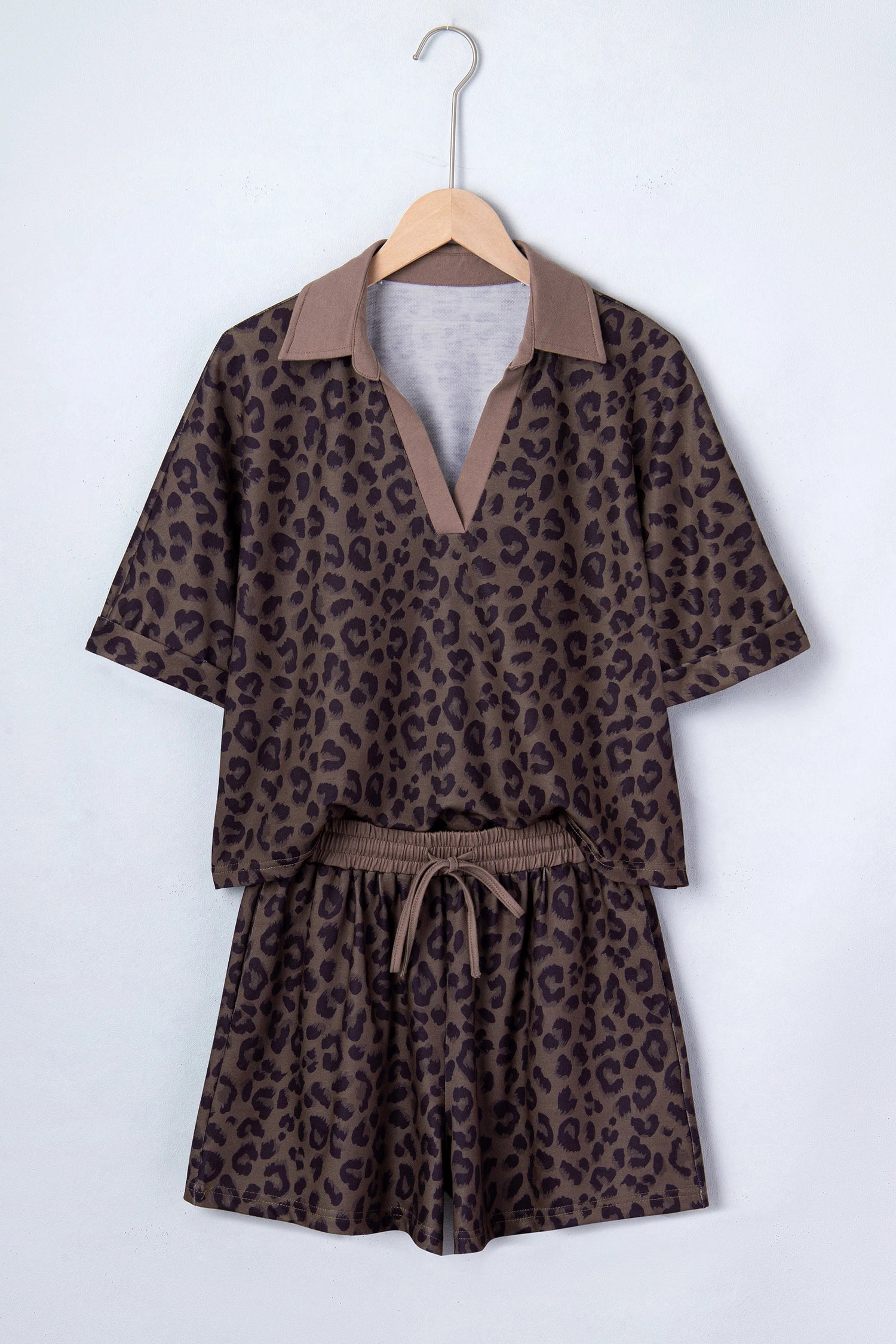 Brown leopard print V-neck high waist two-piece short set by Modern Grace, featuring a stylish matching top and shorts ensemble.