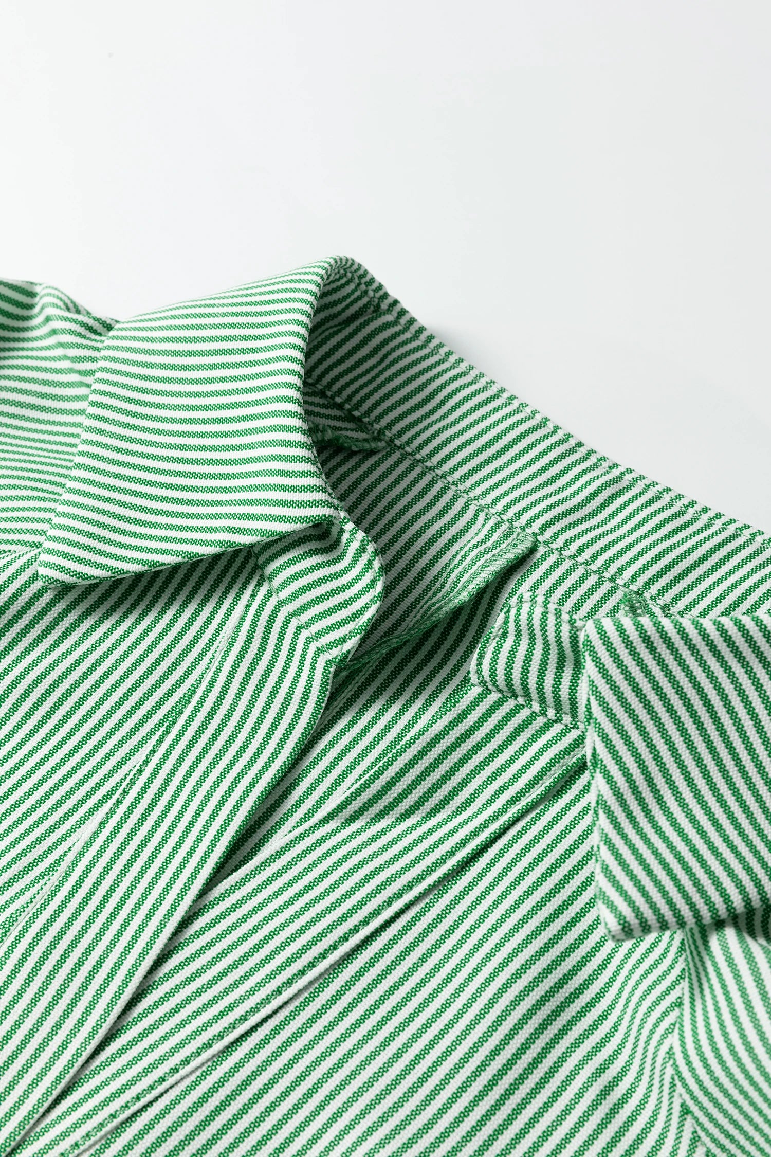 Green striped print blouse by Modern Grace with a collared split neck and half sleeves, featuring a stylish and casual design.