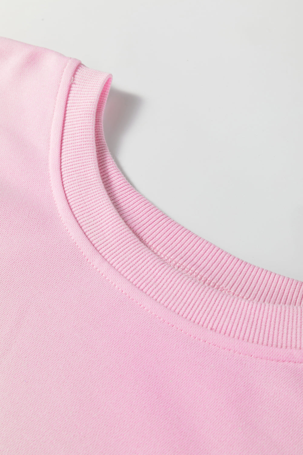 Plus size pink colorblock patchwork sweatshirt by Modern Grace featuring a cozy, fashionable design with a curvy fit.