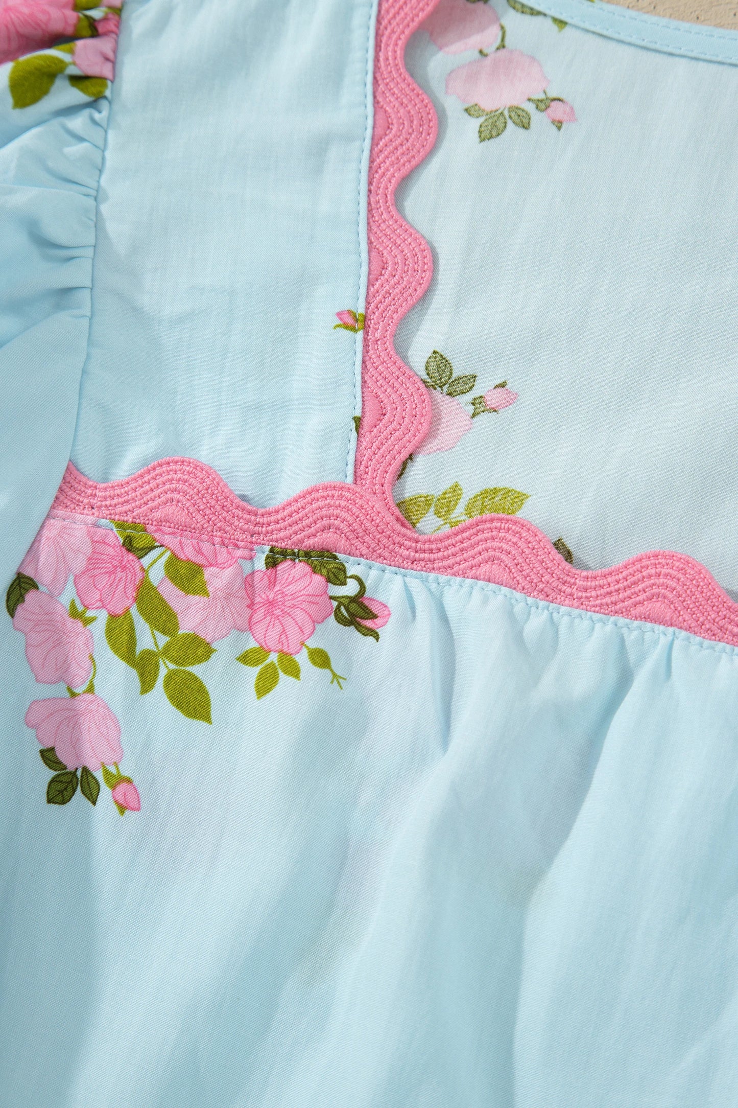 Sky blue floral Ricrac trim square neck blouse with bubble sleeves from Modern Grace, featuring a stylish and feminine design.