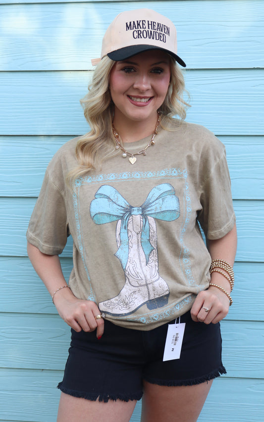 Modern Grace cowboy boots graphic T-shirt with bow ribbon and lunar dye design, casual graphic tee for stylish Western-inspired look.