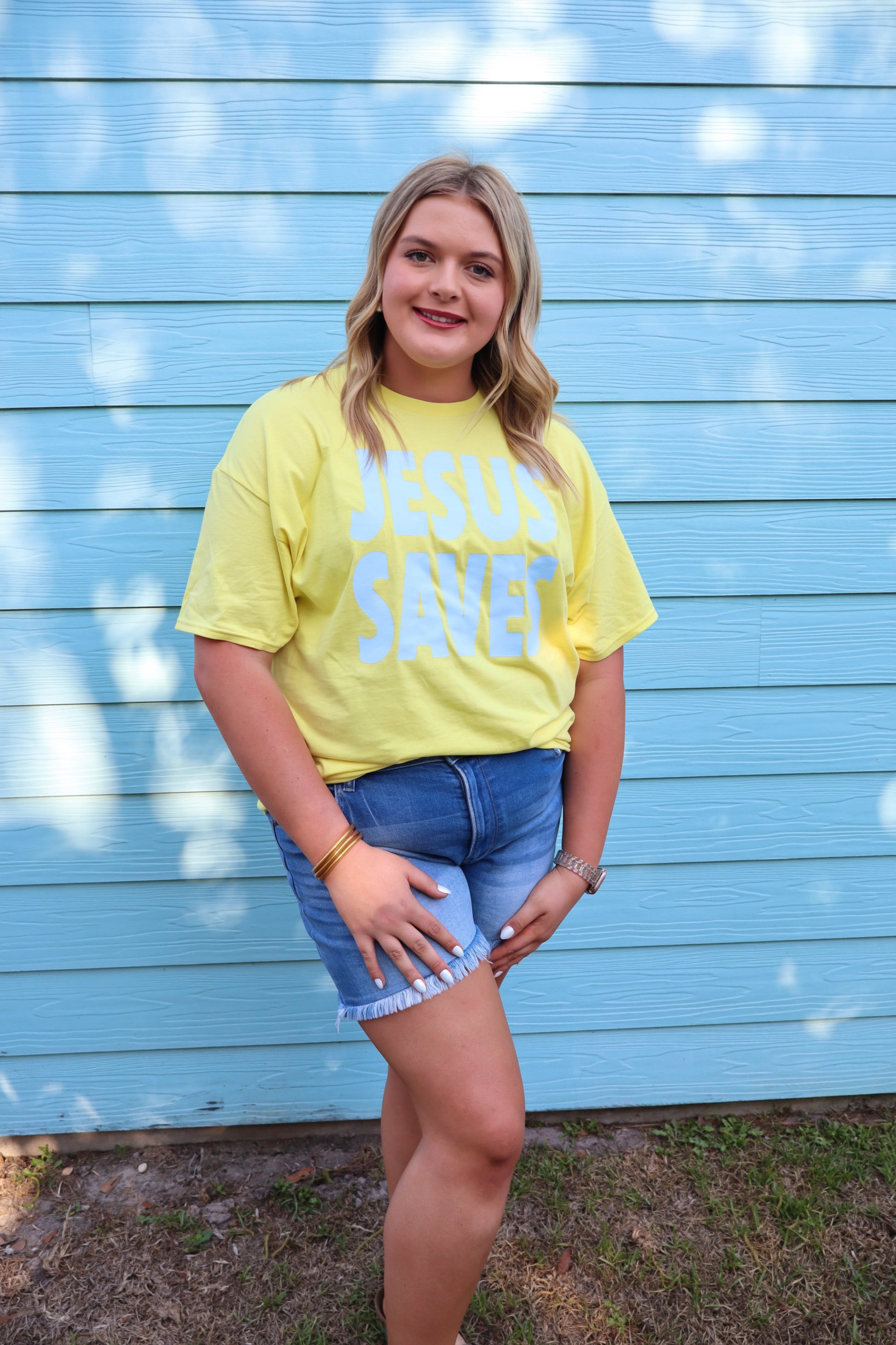 Modern Grace Jesus Saves short sleeve T-shirt featuring bold text and casual fit, made from comfortable fabric.