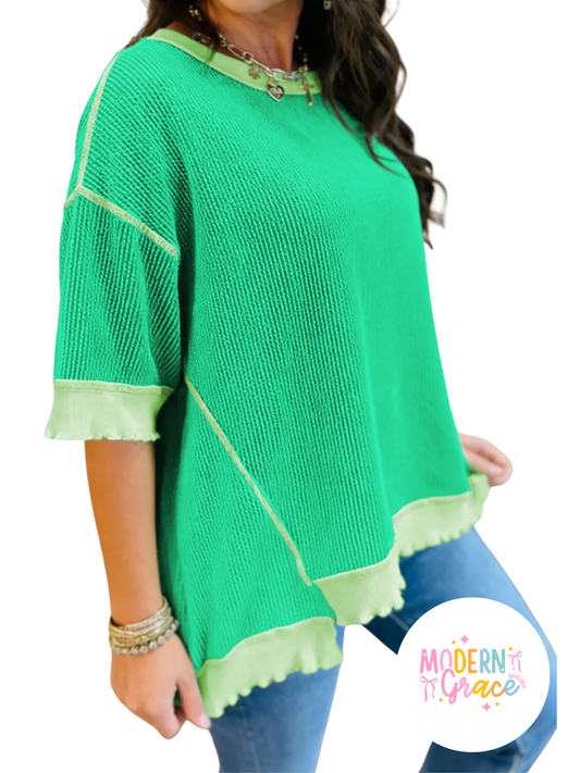 Mint green twisted rib knit tee with uneven hem and drop shoulder design by Modern Grace, showcasing a casual, stylish top.