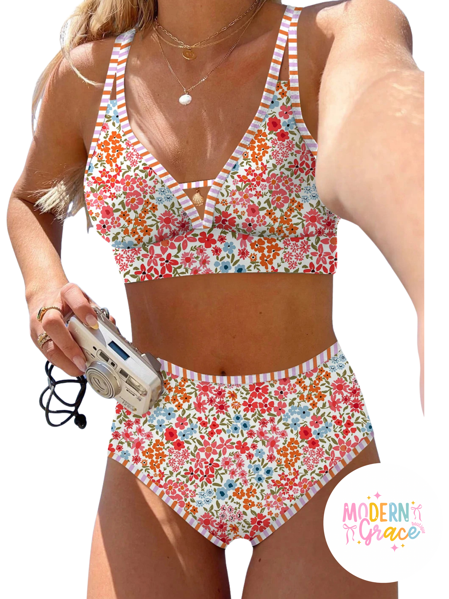 Red floral print bikini top with contrast trim, adjustable straps, padded design, by Modern Grace swimwear.