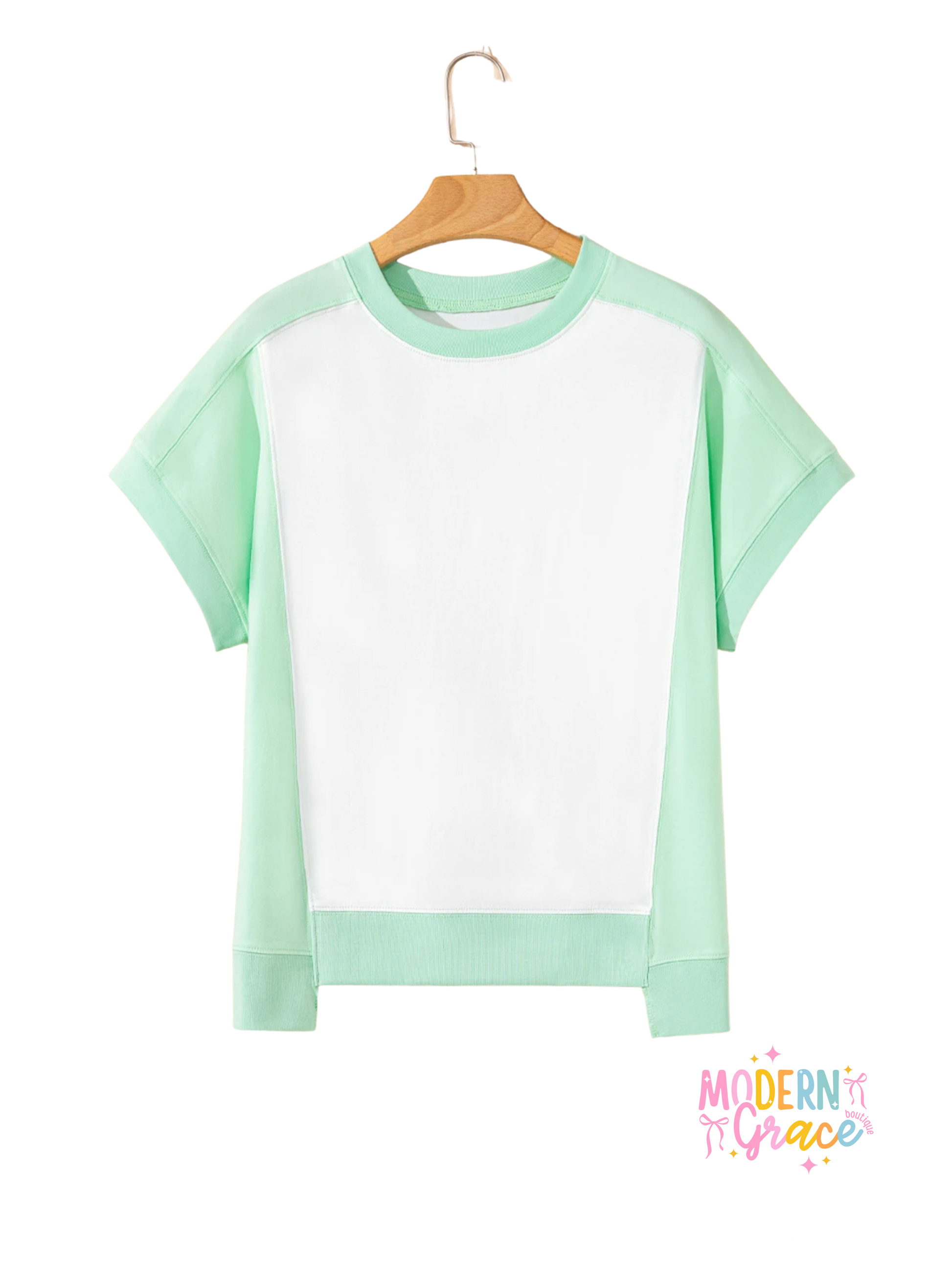Light green Modern Grace crew neck T-shirt with color block design and exposed seams, showcasing a casual, stylish fit.
