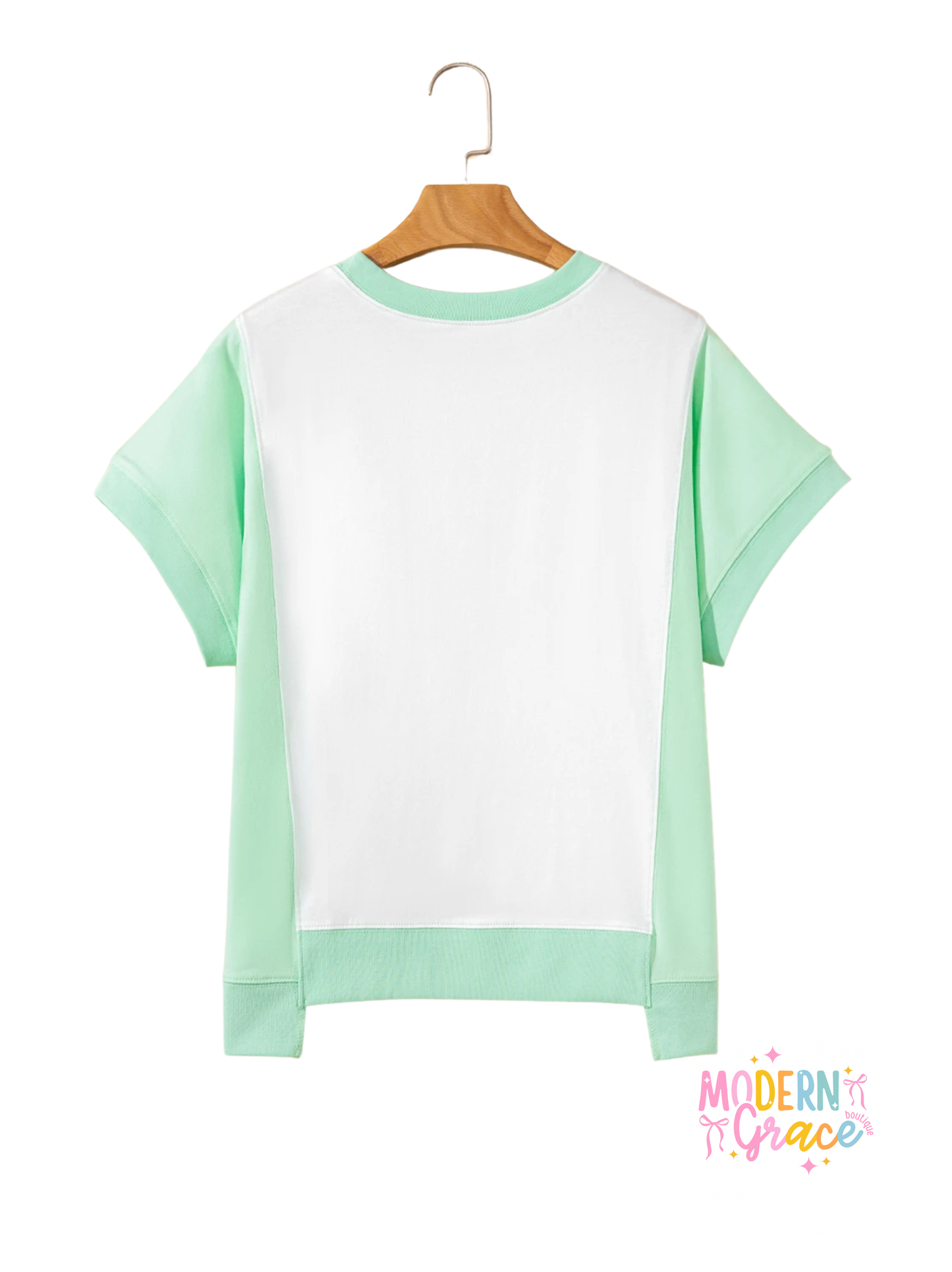 Light green color block crew neck T-shirt by Modern Grace with exposed seam details and a casual, modern design.