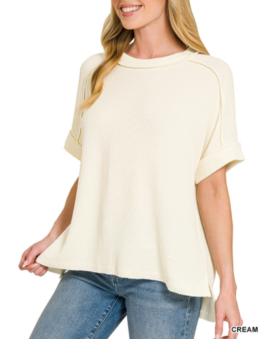 Cream Zenana raw edge top with raised rib cuff sleeves and casual raw hem, featuring a relaxed fit and stylish design.