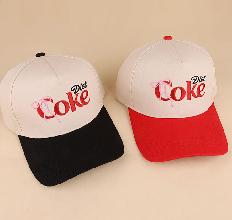 Red Coquette Bow Diet Coke two-tone cotton hat by Modern Grace featuring a stylish bow and casual design.