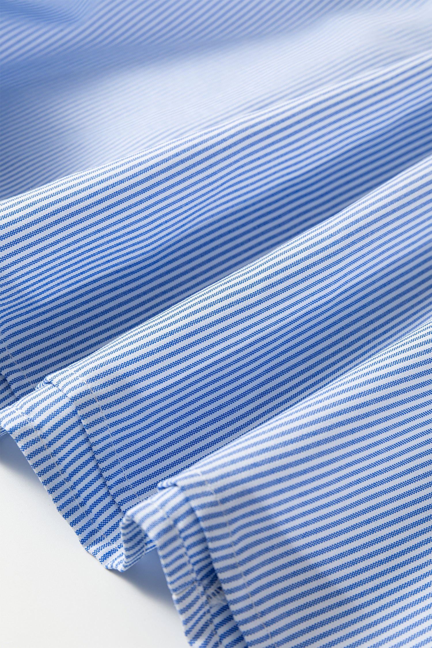 Sky blue stripe plus size midi dress by Modern Grace featuring shirred details, collar, and V-neck design.
