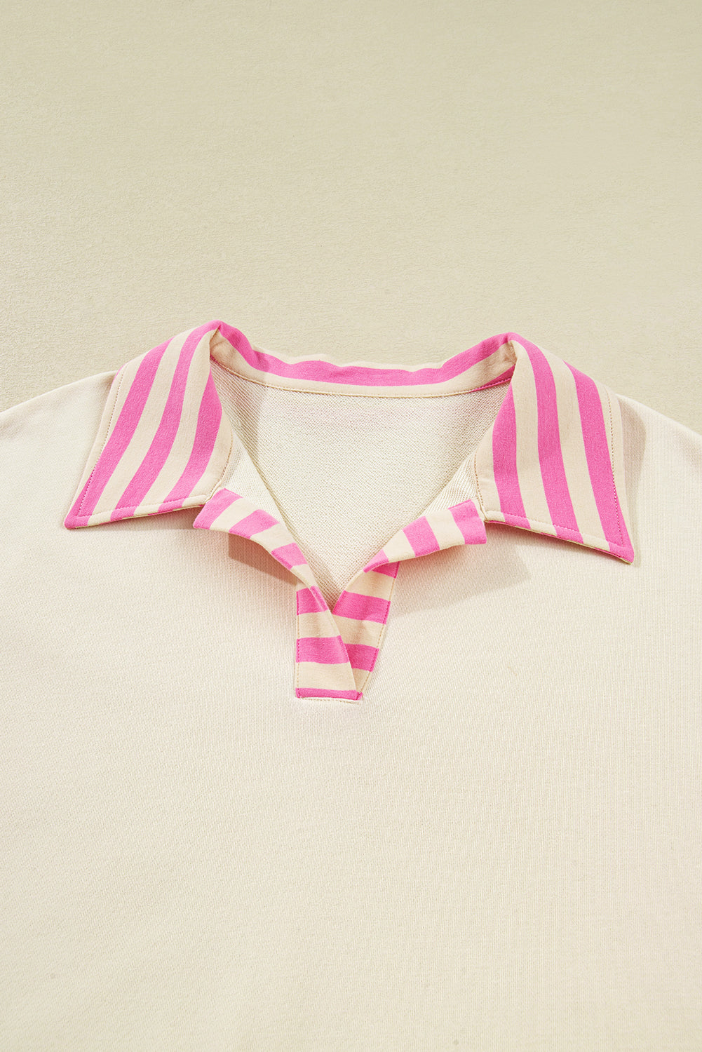 Plus size pink stripe polo collar drop shoulder pullover by Modern Grace, featuring a cozy sweatshirt style with a relaxed fit.