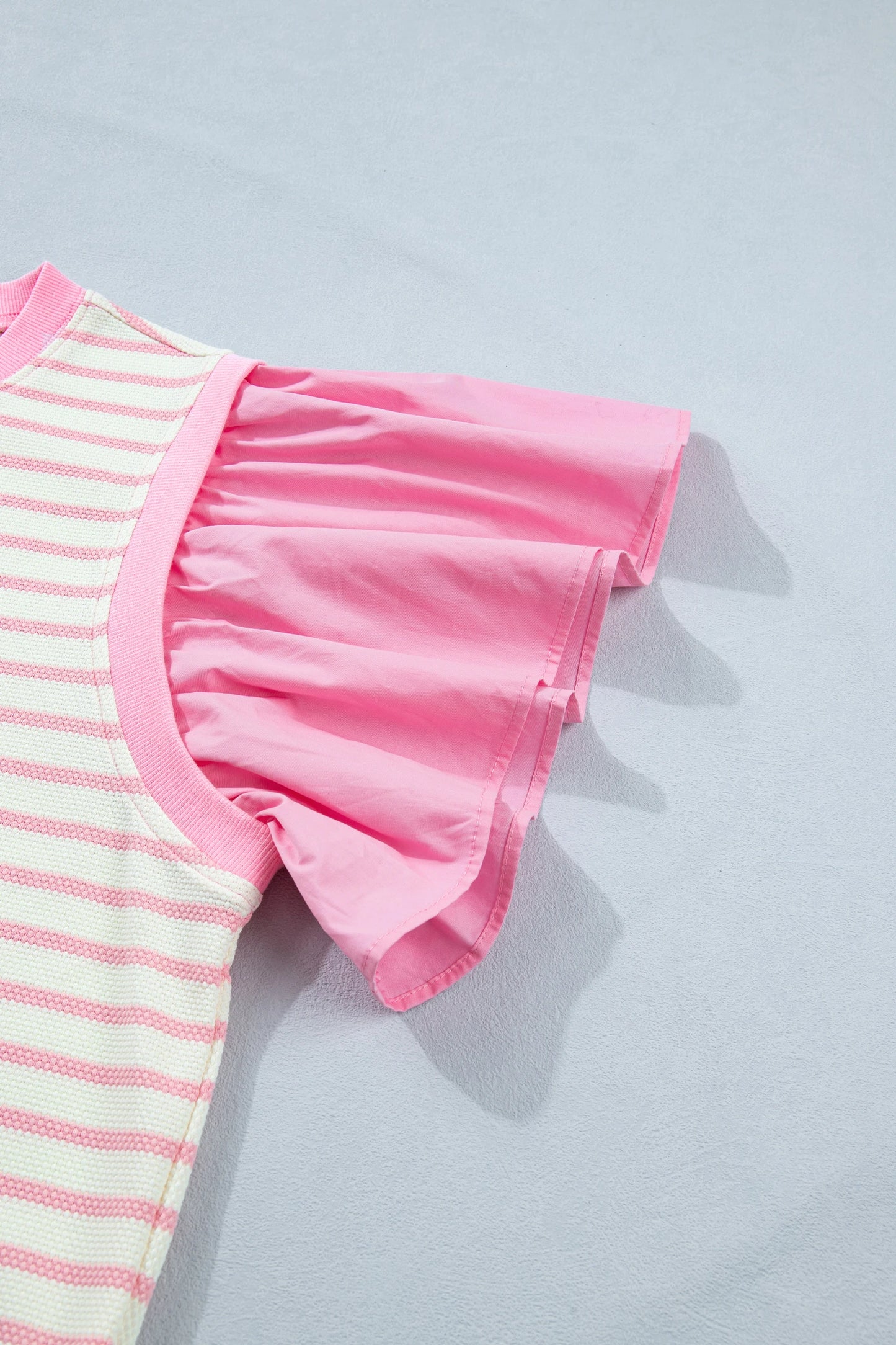 Pink stripe colorblock ruffle short sleeve patchwork blouse by Modern Grace, featuring stylish design and lightweight fabric.